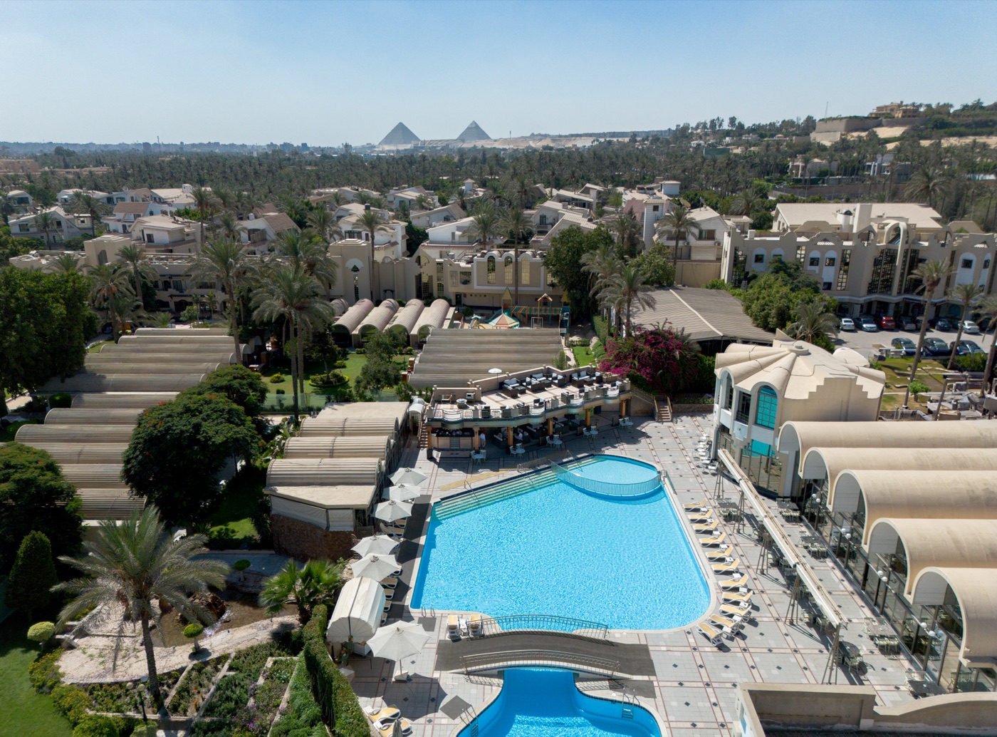 Pool and gardens at JAZ Pyramids Resort